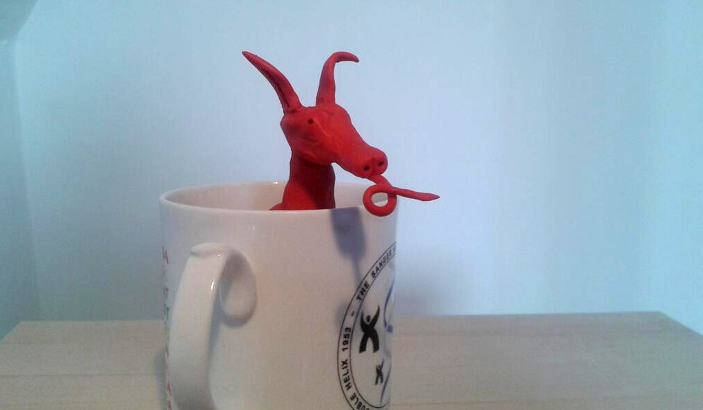 dragon safely in mug of tea